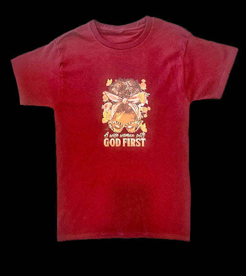 A WOMEN ALWAYS PUTS GOD FIRST MAROON  WOMEN'S TSHIRT